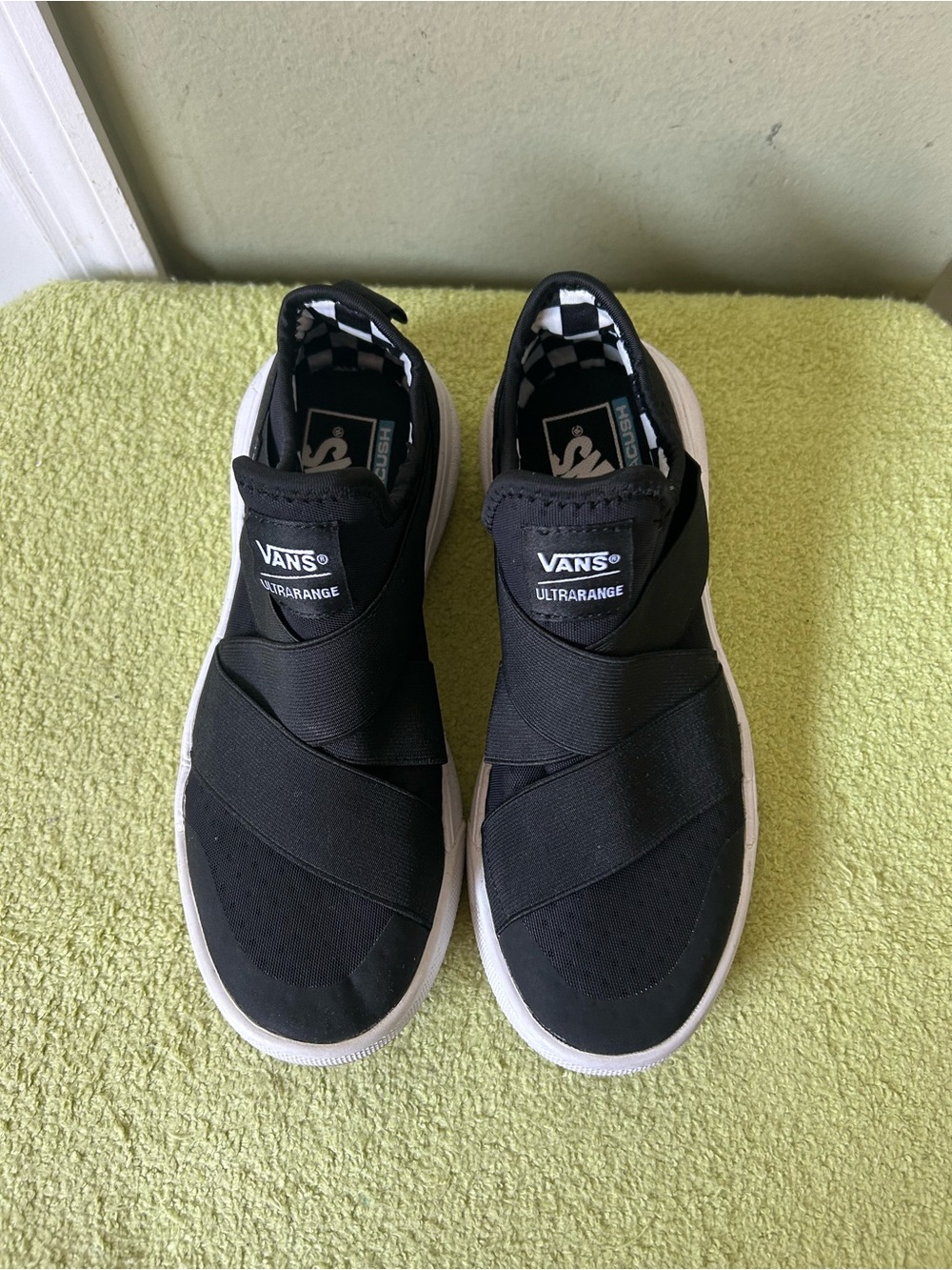 Vans UltraRange Slip-On Sneakers in Black and White